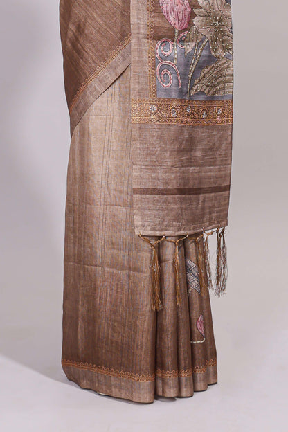 Brown floral design semi tussar saree with self border and matching printed blouse