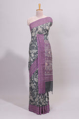 Grey floral design semi tussar saree with contrast lavender border and printed pallu