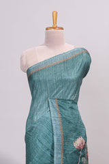 Green floral design semi tussar saree with self border and matching printed blouse