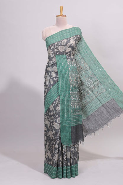 Grey floral design semi tussar saree with contrast green border and printed pallu