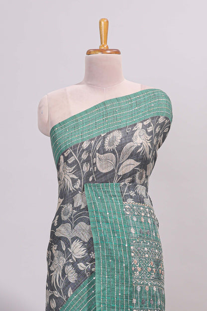 Grey floral design semi tussar saree with contrast green border and printed pallu