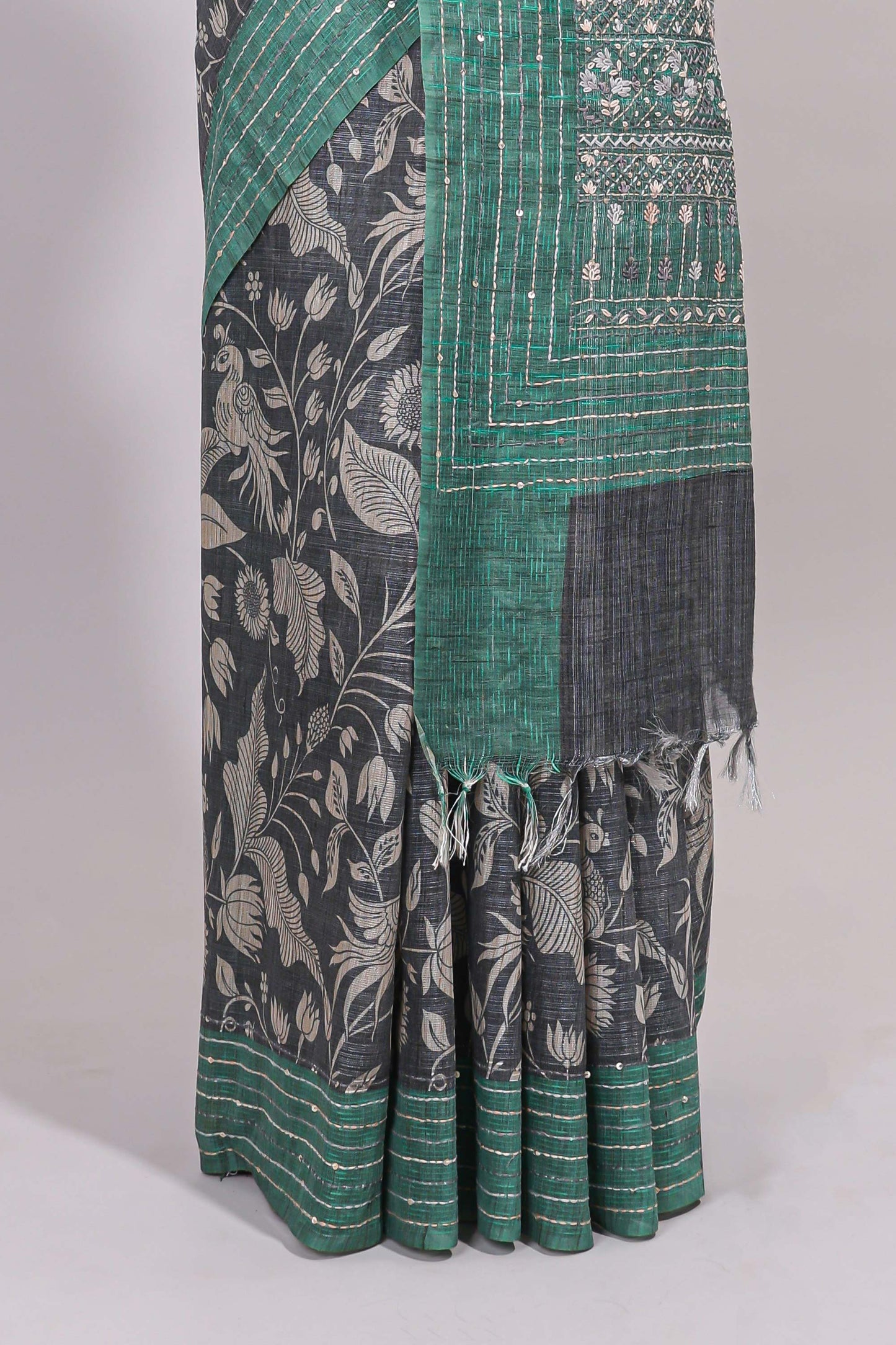 Grey floral design semi tussar saree with contrast green border and printed pallu