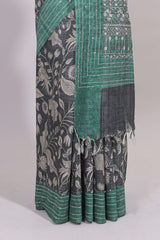 Grey floral design semi tussar saree with contrast green border and printed pallu