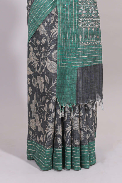 Grey floral design semi tussar saree with contrast green border and printed pallu
