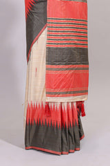 Off white ikkat design semi tussar saree with contrast dual shade border and matching striped blouse