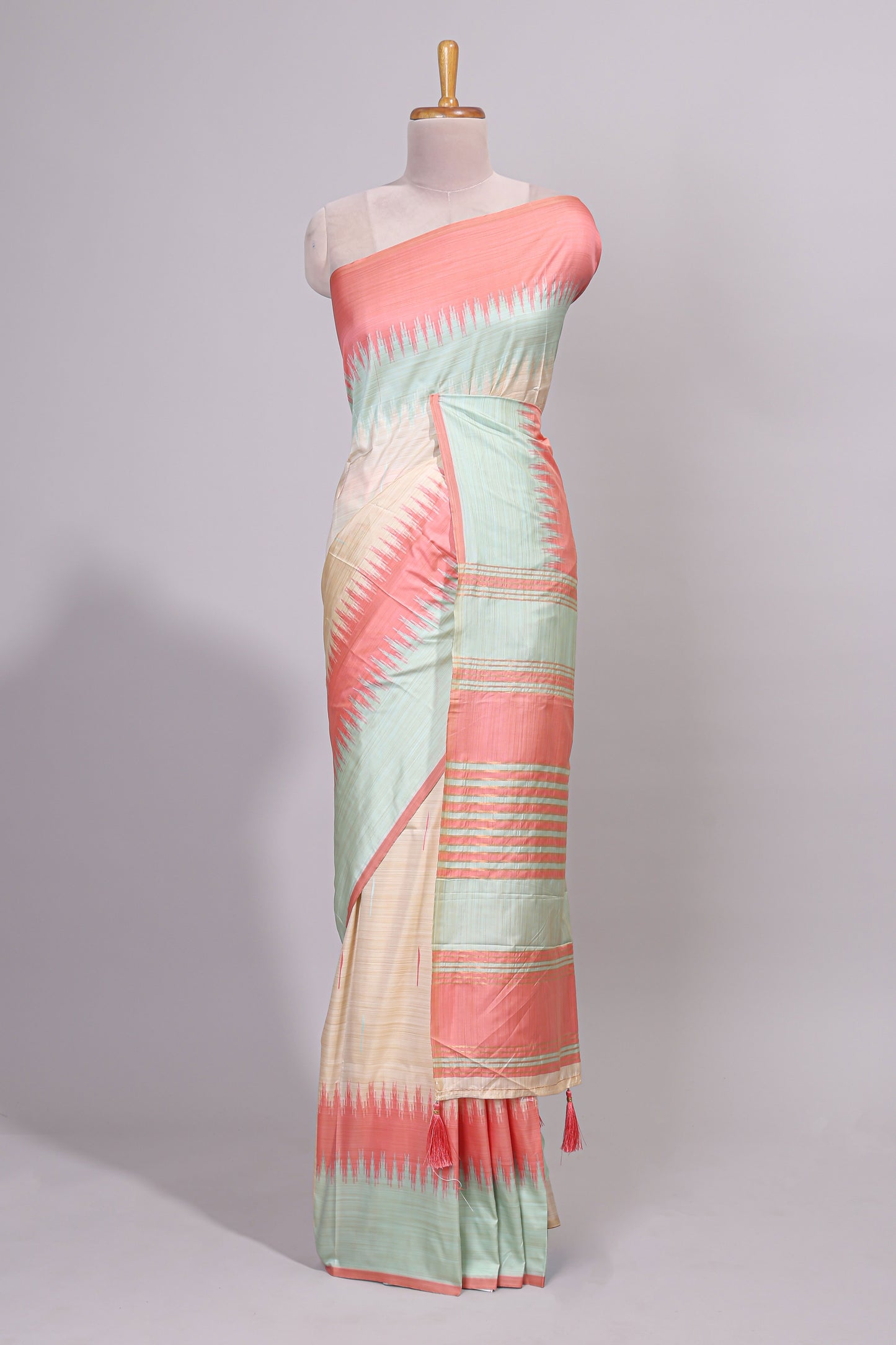 Off white ikkat design semi tussar saree with contrast dual shade border and matching striped blouse