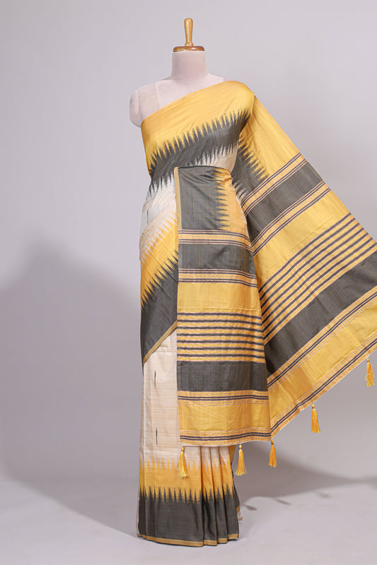 Off white ikkat design semi tussar saree with contrast dual shade border and matching striped blouse