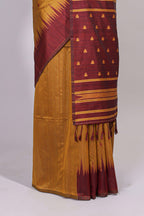 Mustard ikkat motifs design semi tussar saree with contrast border and striped blouse