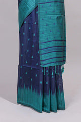 Blue ikkat motifs design semi tussar saree with contrast border and striped blouse