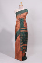 Rust orange ikkat motifs design semi tussar saree with contrast border and motifs blouse