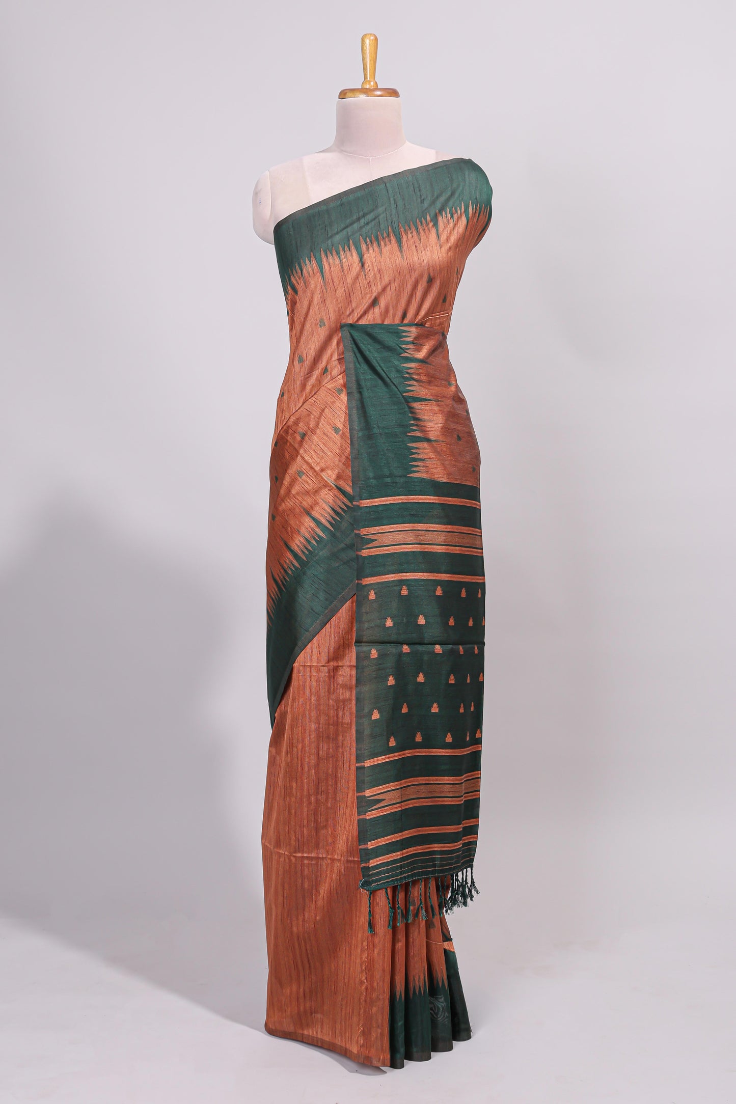 Rust orange ikkat motifs design semi tussar saree with contrast border and motifs blouse