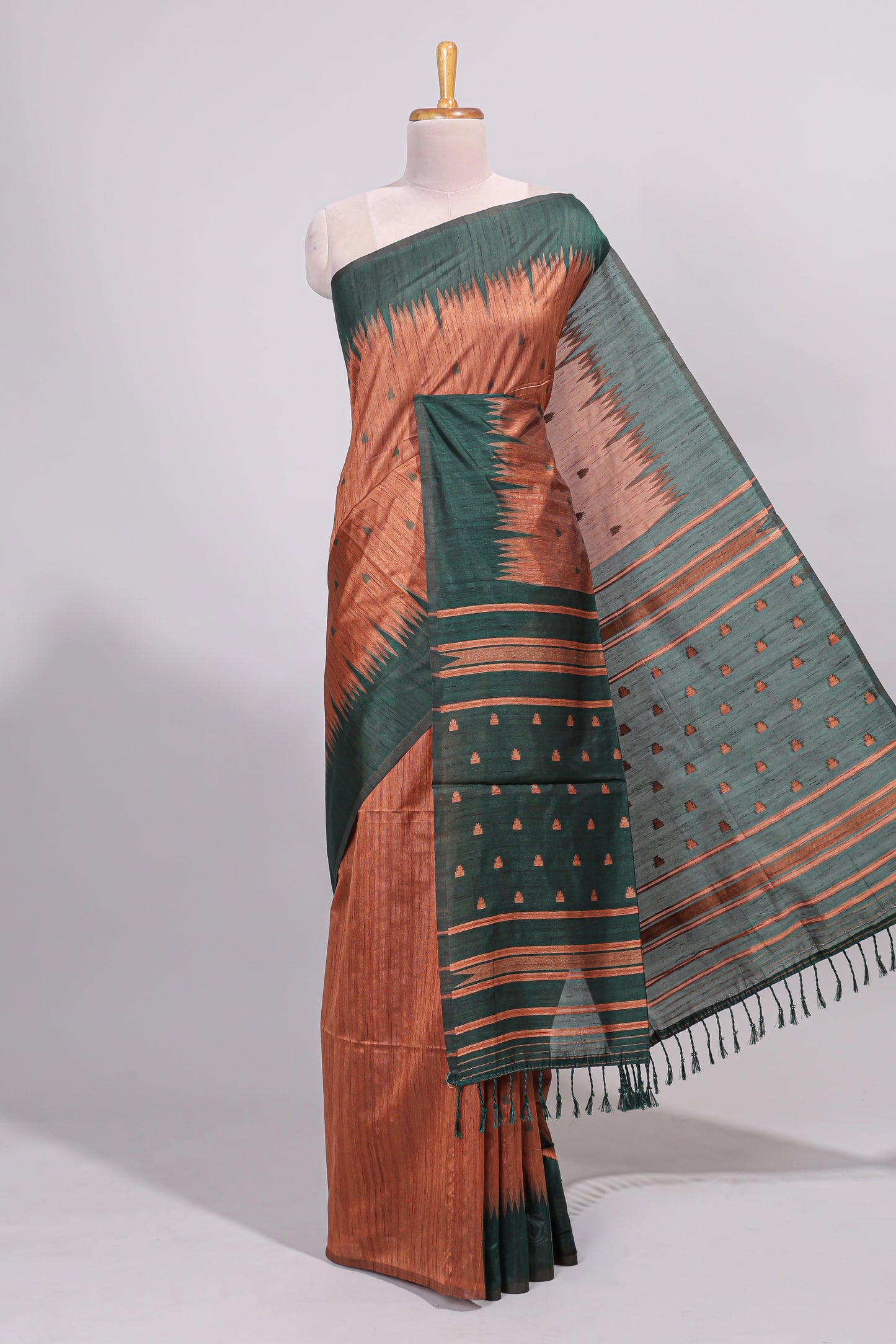 Rust orange ikkat motifs design semi tussar saree with contrast border and motifs blouse