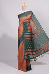 Rust orange ikkat motifs design semi tussar saree with contrast border and motifs blouse