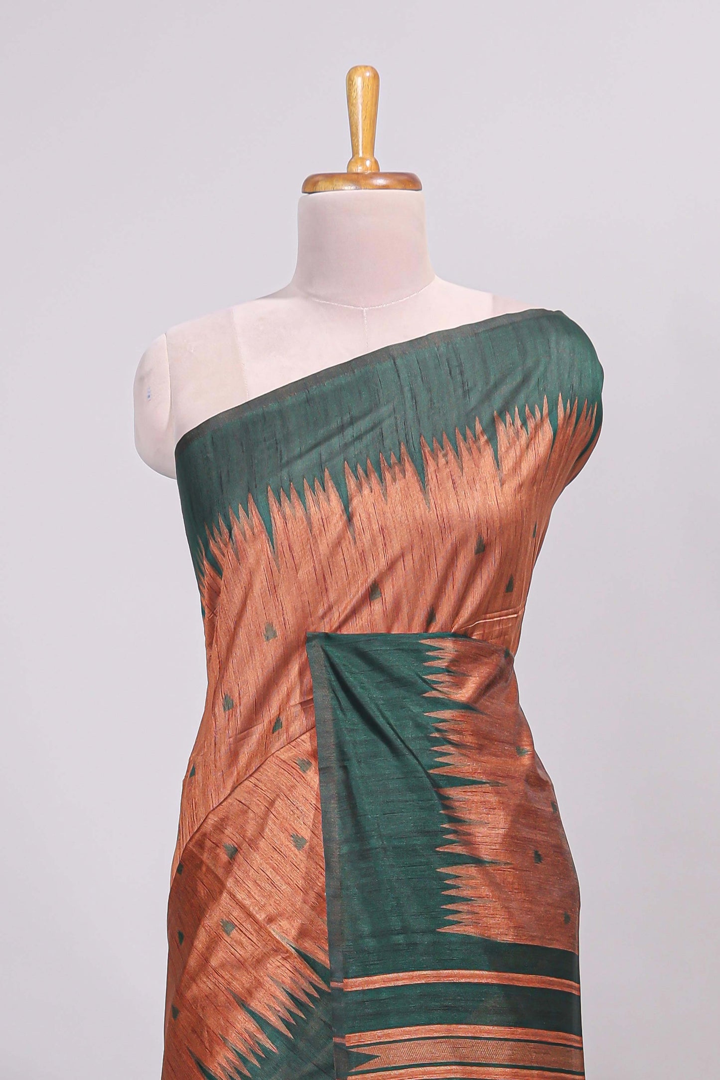 Rust orange ikkat motifs design semi tussar saree with contrast border and motifs blouse