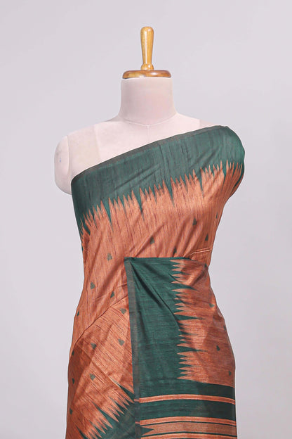 Rust orange ikkat motifs design semi tussar saree with contrast border and motifs blouse