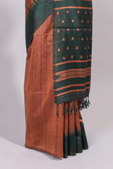 Rust orange ikkat motifs design semi tussar saree with contrast border and motifs blouse