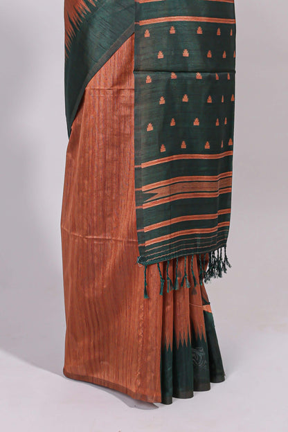 Rust orange ikkat motifs design semi tussar saree with contrast border and motifs blouse