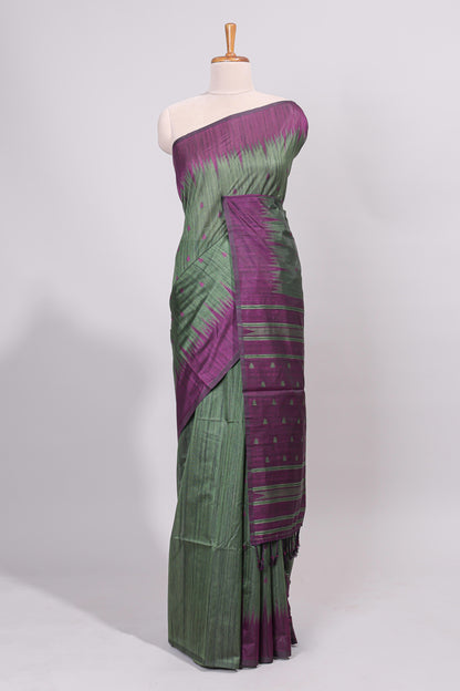 Bottel green ikkat motifs design semi tussar saree with contrast border and motifs blouse