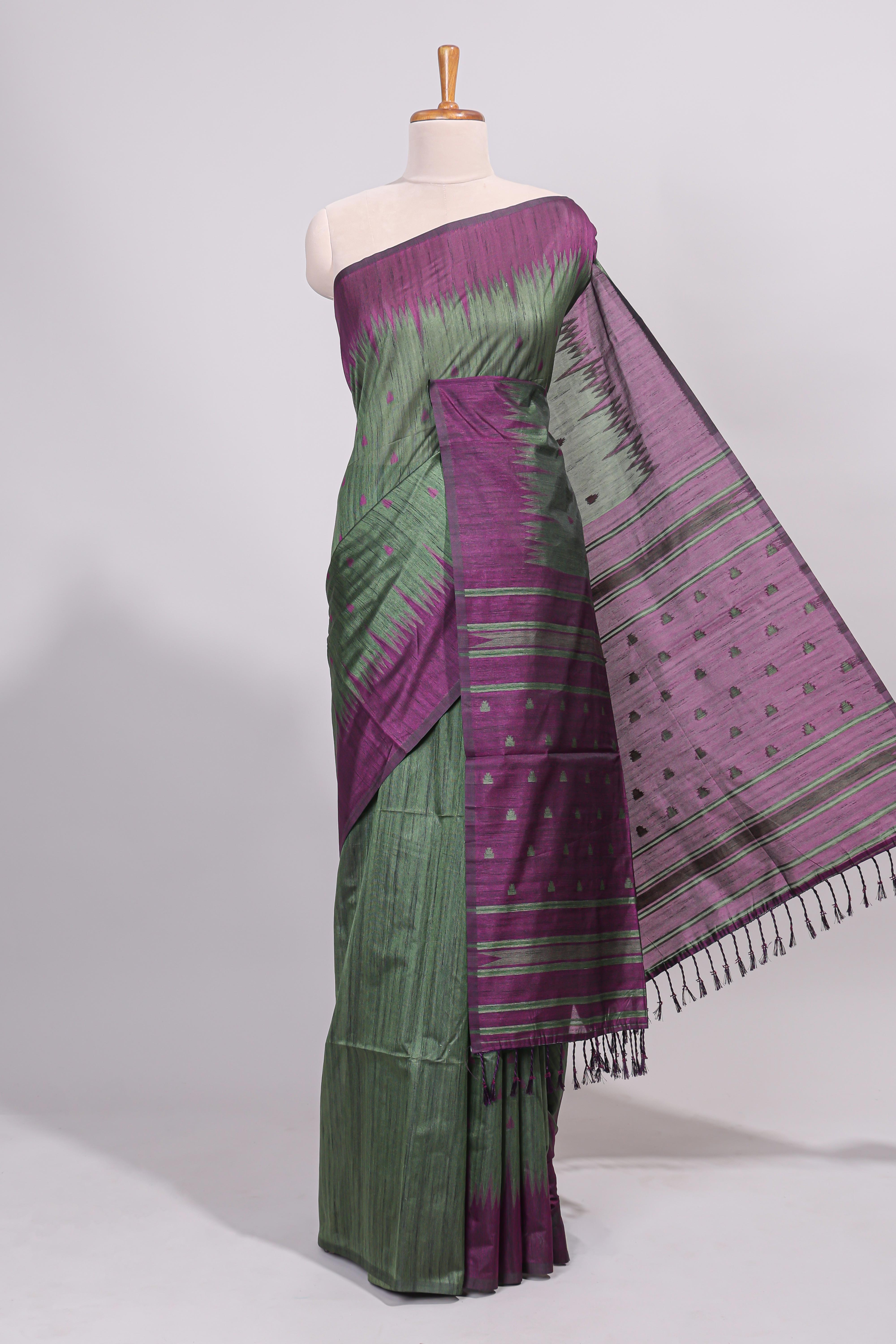 Bottel green ikkat motifs design semi tussar saree with contrast border and motifs blouse