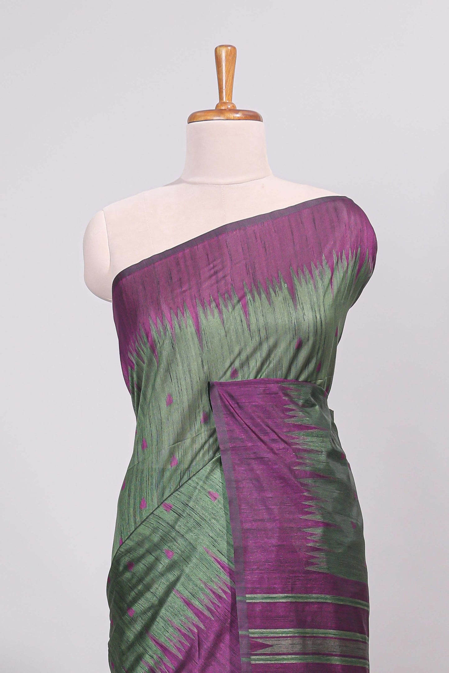 Bottel green ikkat motifs design semi tussar saree with contrast border and motifs blouse