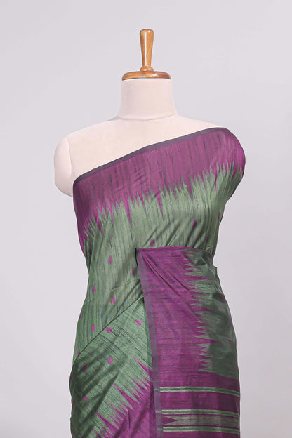 Bottel green ikkat motifs design semi tussar saree with contrast border and motifs blouse