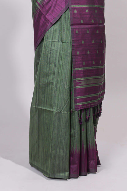 Bottel green ikkat motifs design semi tussar saree with contrast border and motifs blouse