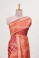 Rust maroon tussar saree all over body ikkat print with contrast small zari border , bandhani print pallu and ikkat contrast blouse