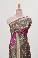 Violet tussar saree body ikkat print with contrast small zari border , bandhani print pallu and ikkat contrast blouse