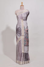 Multi colour kalamakri art  tussar saree  with floral creeper prints zari border and kalamkari motif print pallu