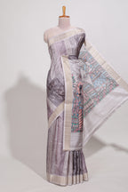 Multi colour kalamakri art  tussar saree  with floral creeper prints zari border and kalamkari motif print pallu