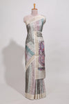 Pastel green colour kalamakri arttussar sareewith floral creeper prints zari border and kalamkari peacock motif print pallu