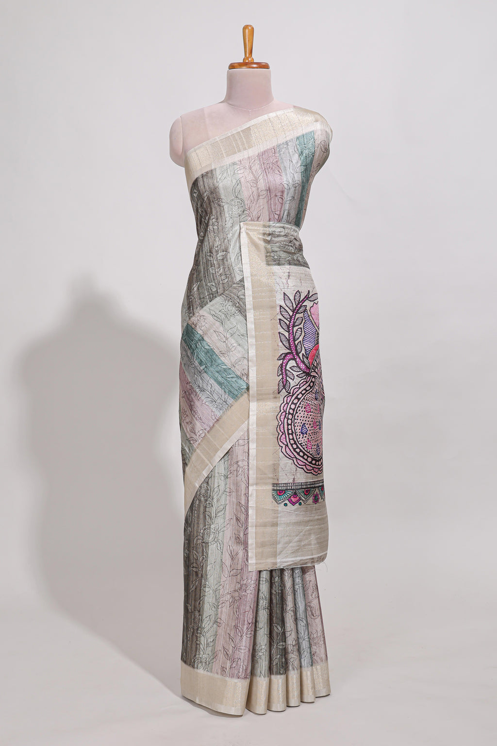 Pastel green colour kalamakri art  tussar saree  with floral creeper prints zari border and kalamkari peacock motif print pallu