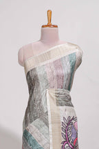Pastel green colour kalamakri art  tussar saree  with floral creeper prints zari border and kalamkari peacock motif print pallu