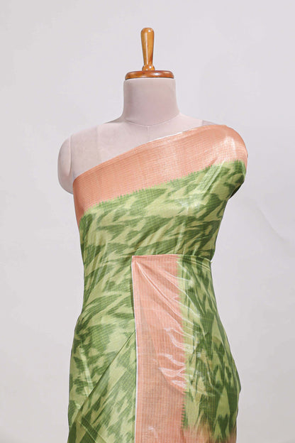 green colour ikkat  design  semi tussar saree with contrast border and  blouse