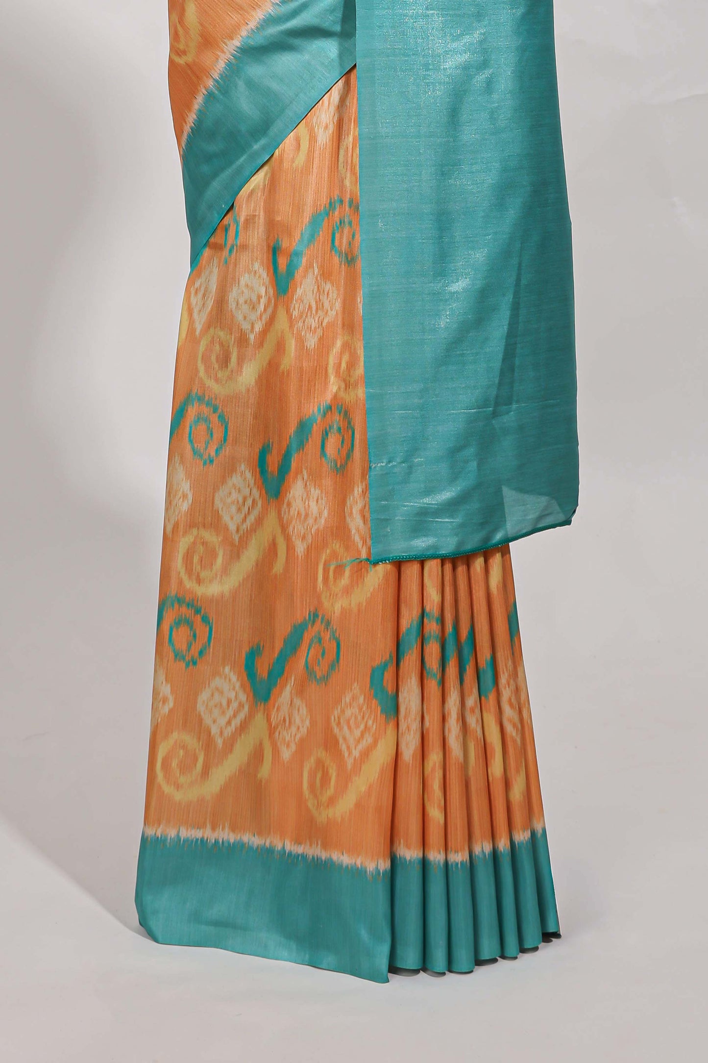orange colour and ikkat printed design  semi tussar saree with contrast border and  contrast blouse (Copy)