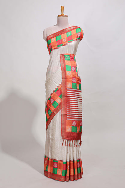 Cream colour  semi tussar saree with contrast checked  border and  contrast  checked blouse