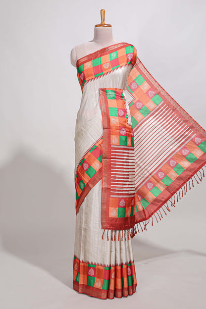 Cream colour  semi tussar saree with contrast checked  border and  contrast  checked blouse
