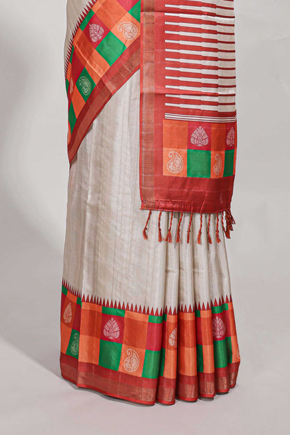 Cream colour  semi tussar saree with contrast checked  border and  contrast  checked blouse