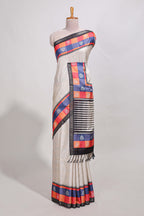 beige colour  semi tussar saree  contrast checked  border and  contrast  checked blouse