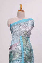 Blue colourprintedsemi tussar saree with pippingborder and leaf printed matching blouse