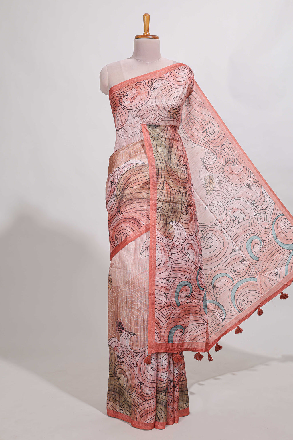 pink colour  printed  semi tussar saree with pipping  border and leaf printed matching blouse