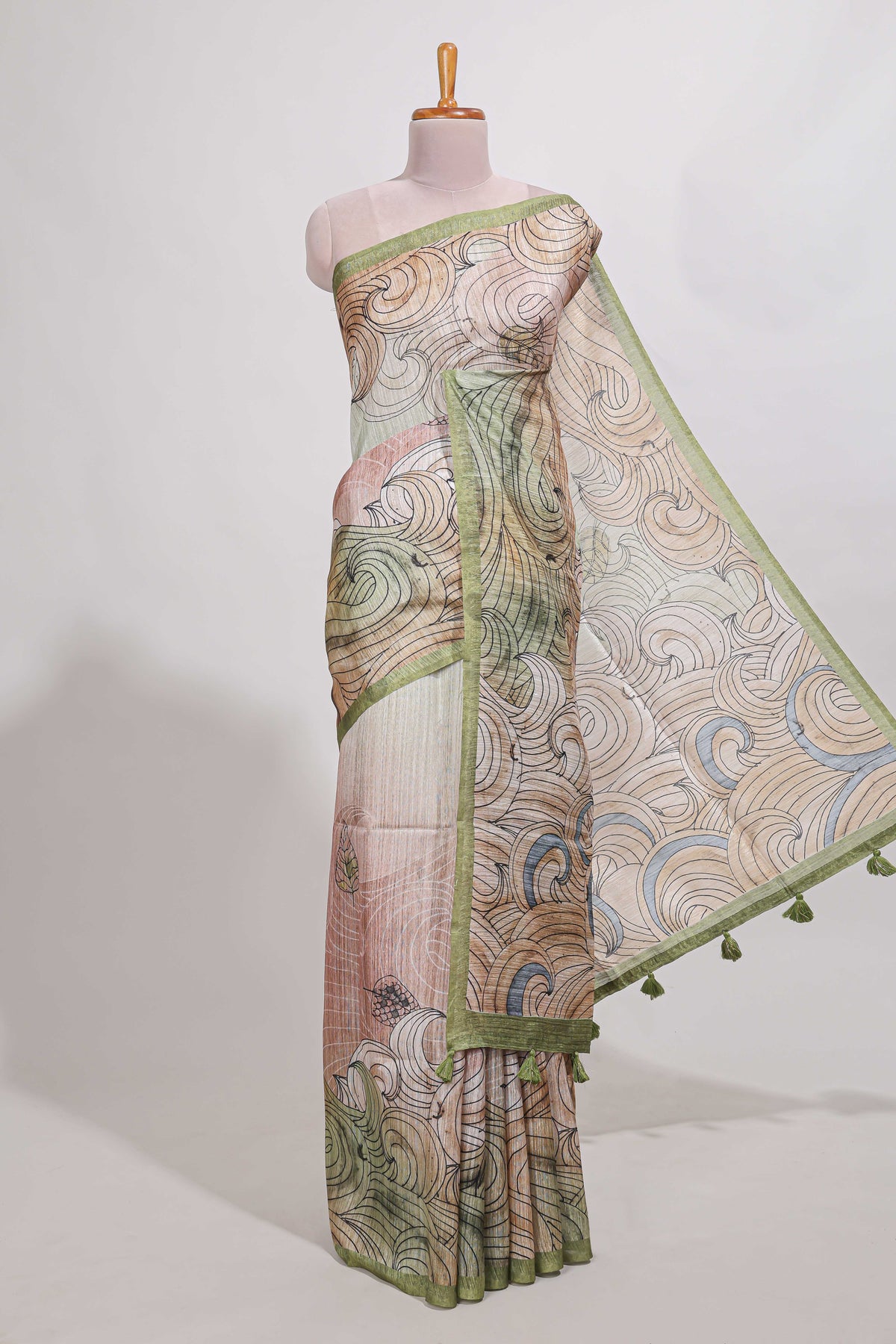 Light green colour  printed  semi tussar saree with pipping  border and leaf printed matching blouse