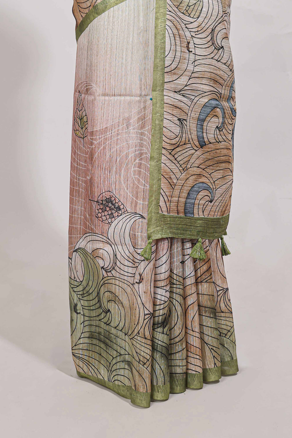 Light green colour  printed  semi tussar saree with pipping  border and leaf printed matching blouse