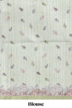 Light green colour  printed  semi tussar saree with pipping  border and leaf printed matching blouse