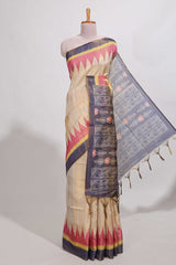 Beige colour semi tussar saree with temple border and tissue blouse