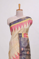 Beige colour semi tussar saree with temple border and tissue blouse