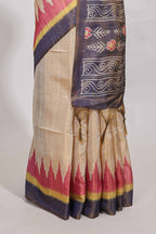 Beige colour semi tussar saree with temple border and tissue blouse