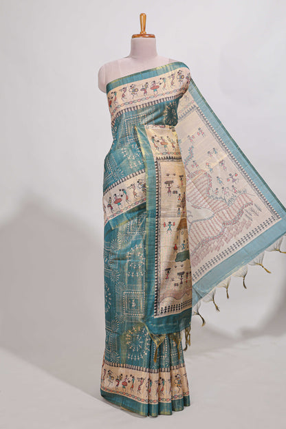 Teal green warli print tussar saree with self print blouse , along with tassels