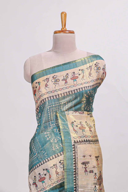 Teal green warli print tussar saree with self print blouse , along with tassels