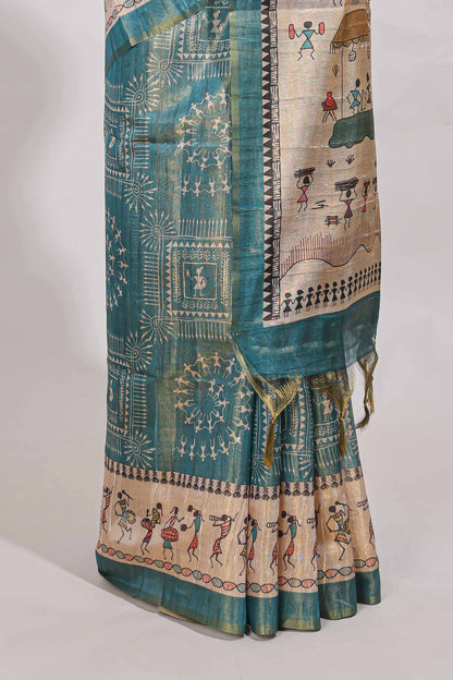 Teal green warli print tussar saree with self print blouse , along with tassels